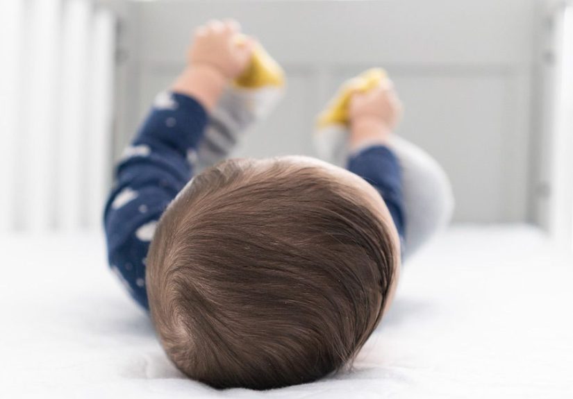 Baby Rolling Over in Sleep: What to Do and If It’s OK