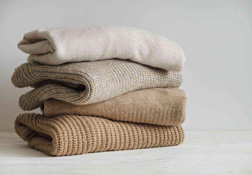 The One Wash Setting That Keeps Sweaters From Shrinking, According to Laundry Pros