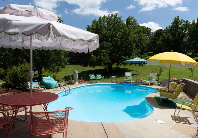 21 Pool Shade Ideas to Keep You Cool by the Water