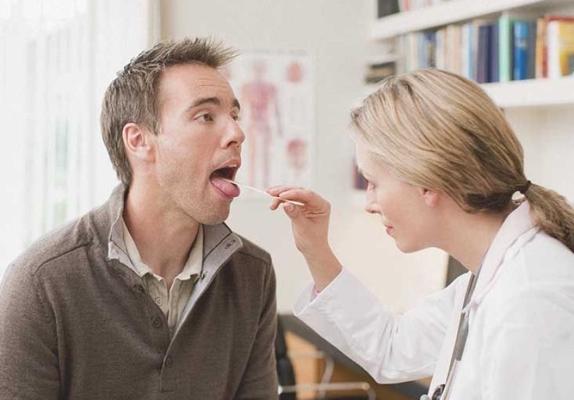 Behçet’s Disease: Symptoms, Photos, Treatment, and More